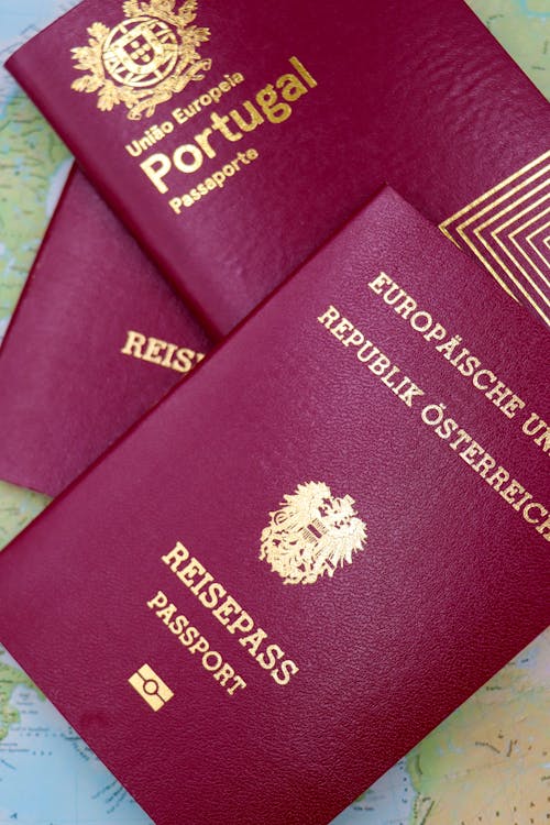 European passports on world map — EU Schengen zone travel insurance for adventure sports