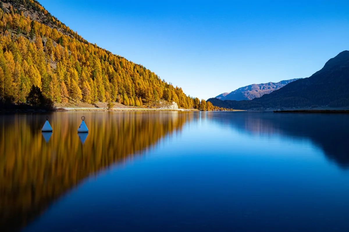 Big Almaty Lake turquoise water autumn mountains Kazakhstan