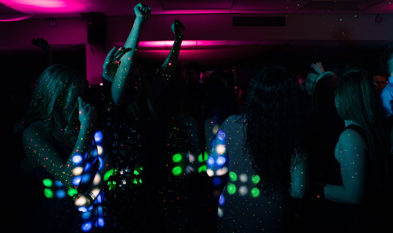 People dancing in a vibrant nightclub – Bali nightlife bars and clubs for adult travelers