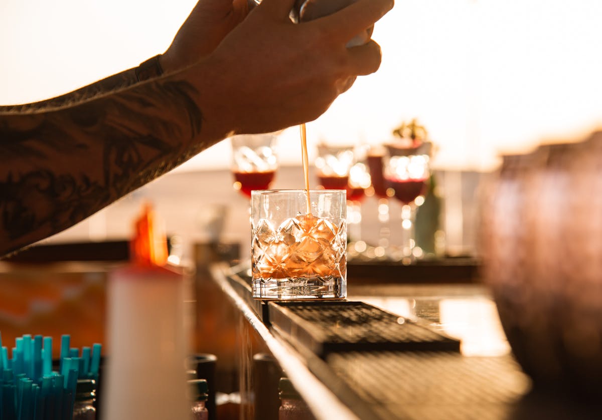 Bartender making cocktails — Cap d'Agde evening nightlife clubs 2026