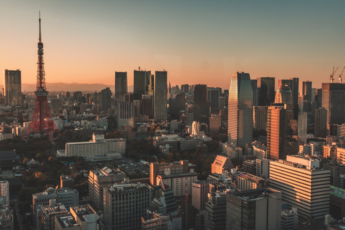 Aerial view of Tokyo Tower and city skyline at sunset – best time to book cheap flights to Tokyo