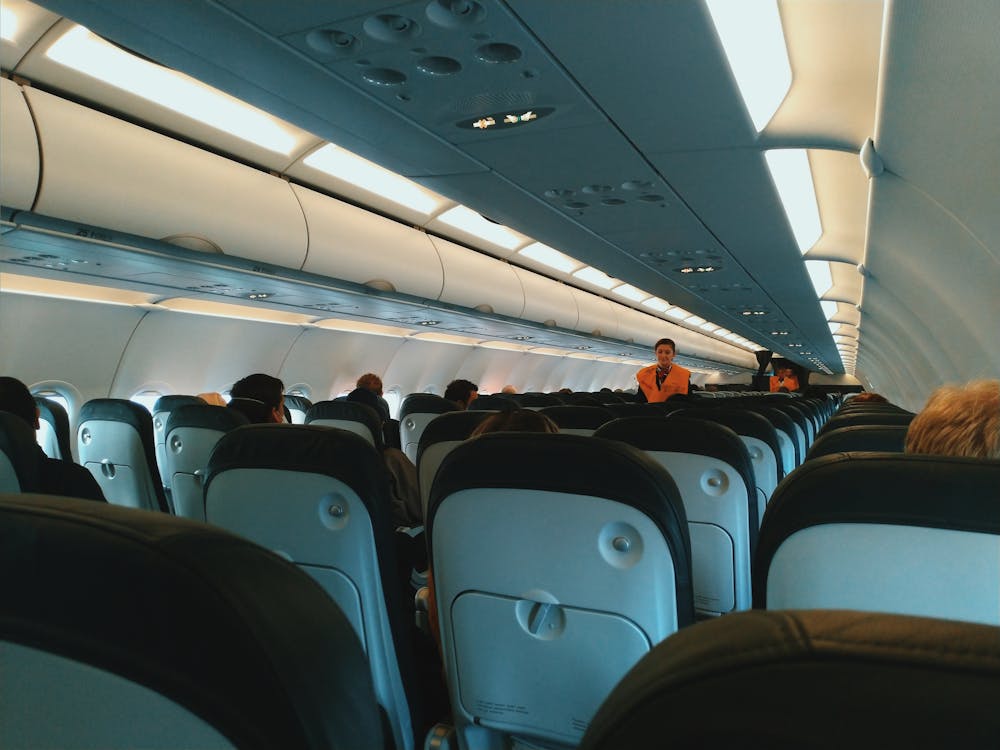 Economy class airplane cabin – 7 tricks to find cheap flights to Tokyo