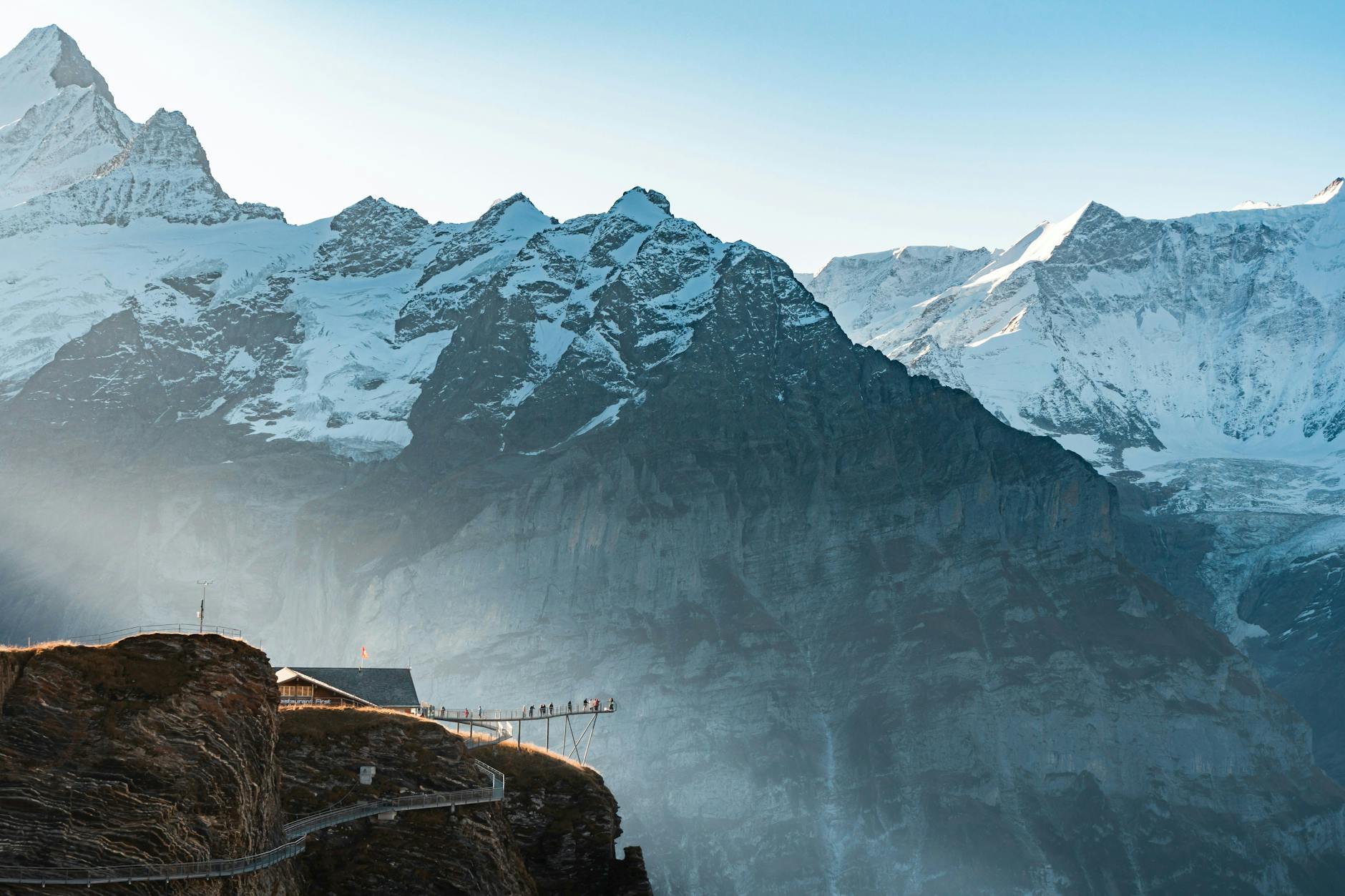 Snowcapped Swiss Alps at sunrise โ gateway to world-class alpine adventure