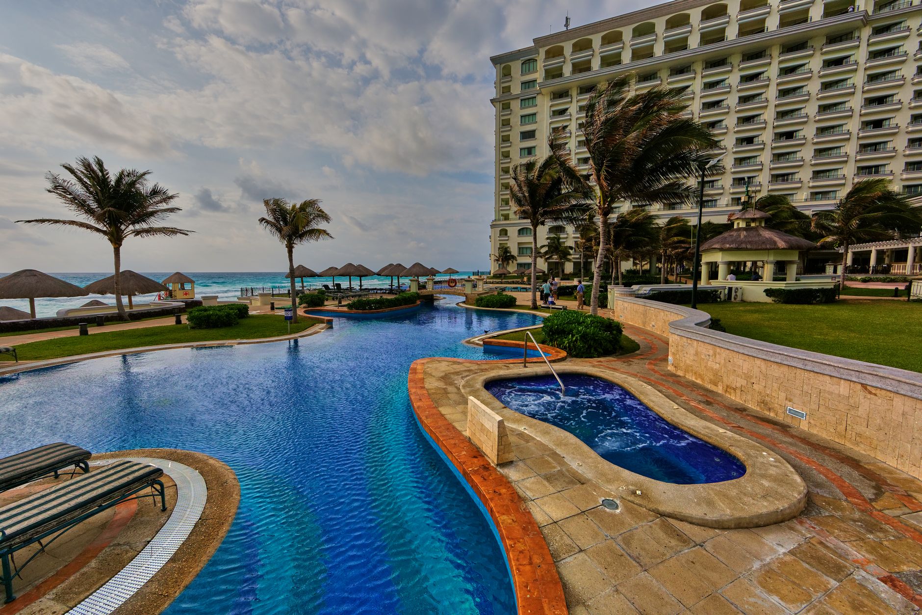 Desire Pearl on the Riviera Maya: a more upscale, intimate couples resort — a large elegant pool and hot tub, refined oc