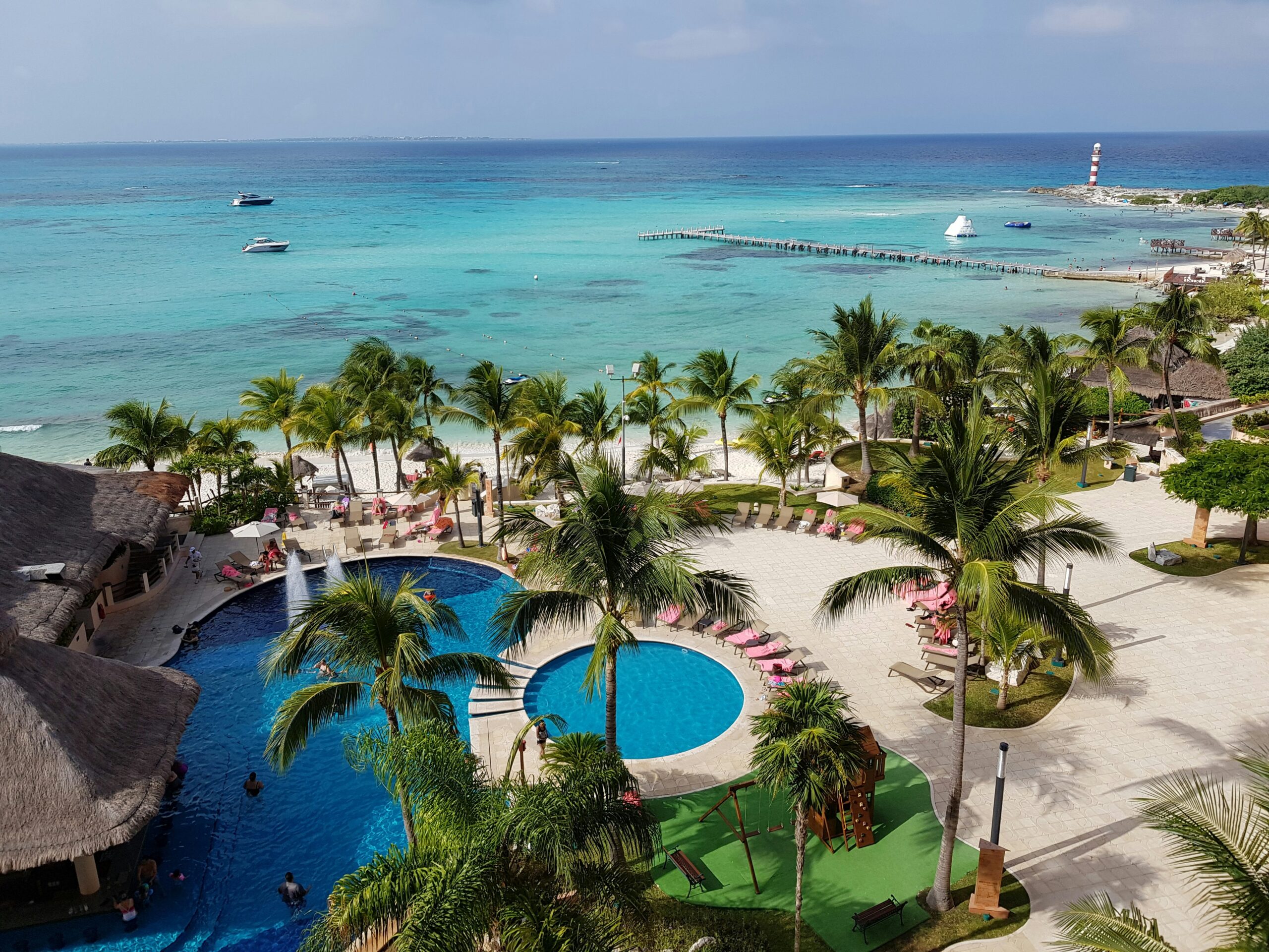 Desire Riviera Maya in Puerto Morelos: an intimate oceanfront resort on the Riviera Maya — pool, palms, Caribbean beach
