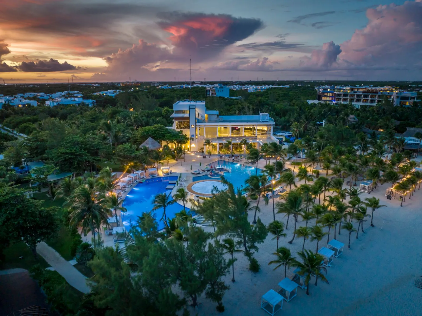 Section 'The vibe: younger, friendlier, and louder after dark' in an article about Desire Riviera Maya Resort 2026: Coup