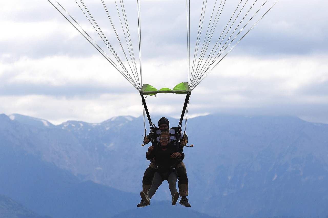 Minute-by-minute tandem skydive: plane ride, exit, freefall, canopy over the Alps