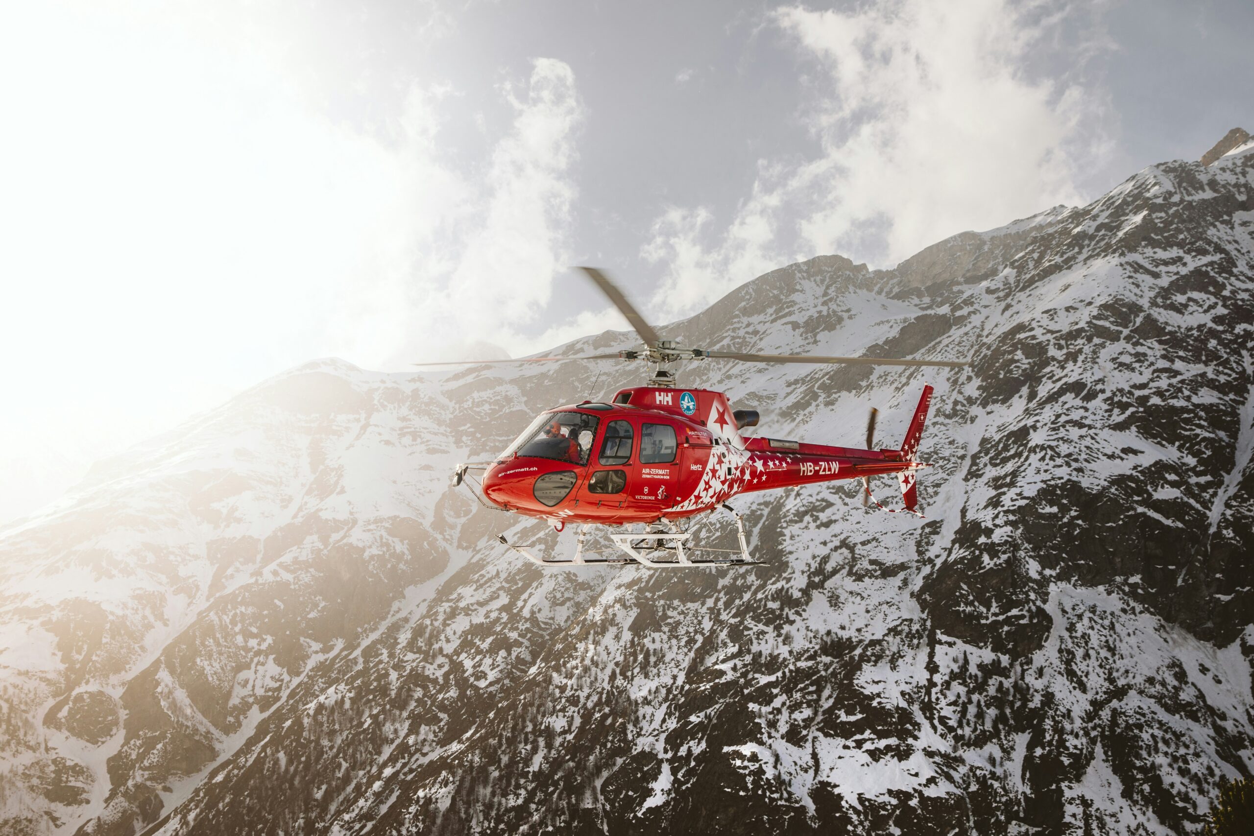 Choosing between a helicopter and airplane skydive over the Swiss Alps