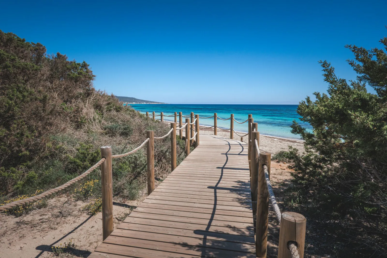Section 'Naturist beach etiquette and how to get there' — show: Mediterranean coastal walking path beach Europe. Europea
