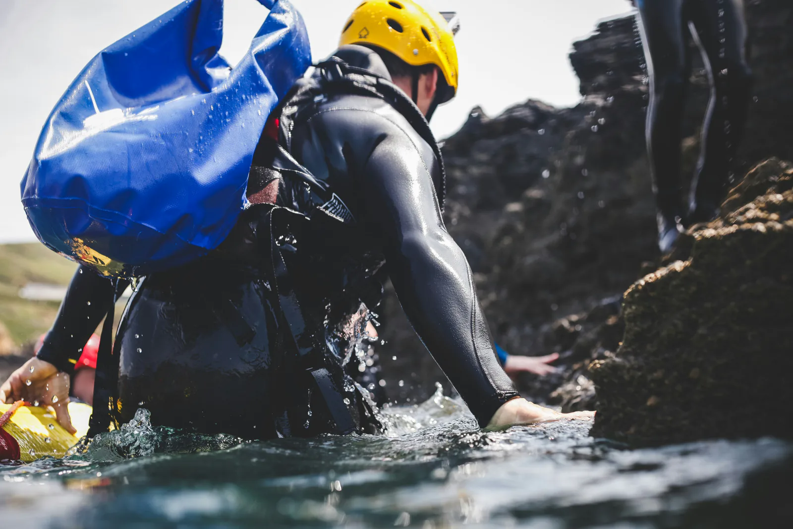 Canyoning gear: neoprene wetsuit, helmet, harness and shoes - what the operator provides versus what you bring yourself