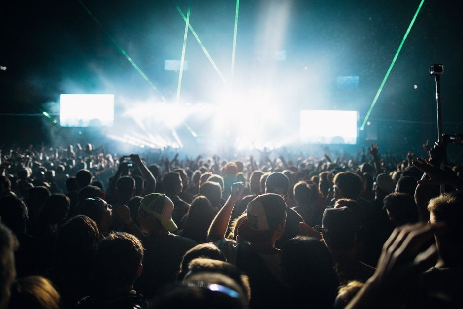 Thrilling live concert experience with a crowd under spectacular laser lights. – Stages, Lineup, and What to Expect on the Dancefloor