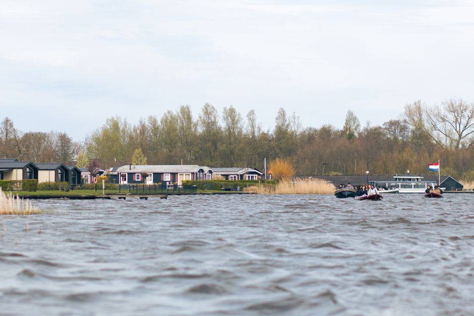 Dutch holiday-park lake cottages with boats on the water near Beekse Bergen, Netherlands. – Where to Stay Near Beekse Bergen