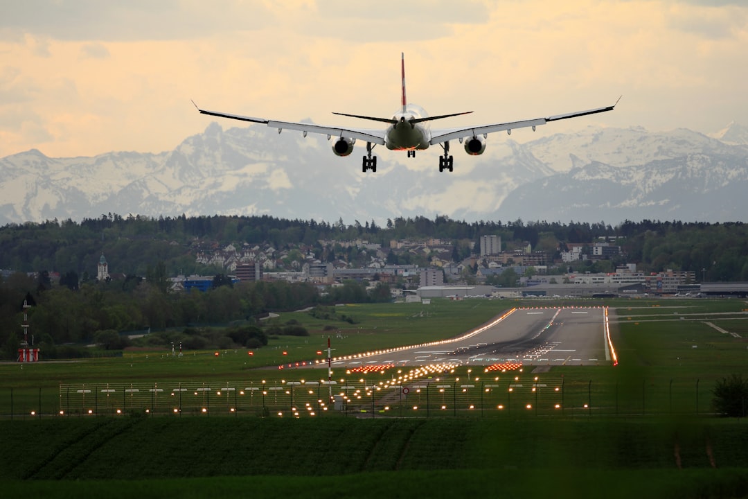 commercial airplane landing on runway – Mistakes That Quietly Inflate Your European Flight Fare
