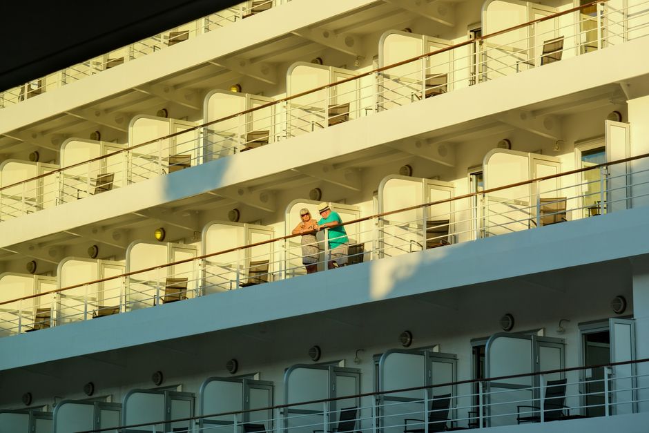 Two adults enjoying a sunny day on a cruise ship balcony. – Quick Answer: Which Cruise Lines Are 100% Adults-Only in 2026