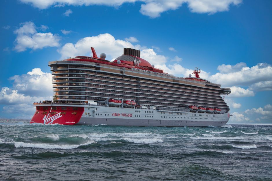 Experience the luxury of Virgin Voyages' Scarlet Lady cruise ship sailing through vibrant ocean waters. – Virgin Voyages: 18+ on Every Sailing, No Exceptions