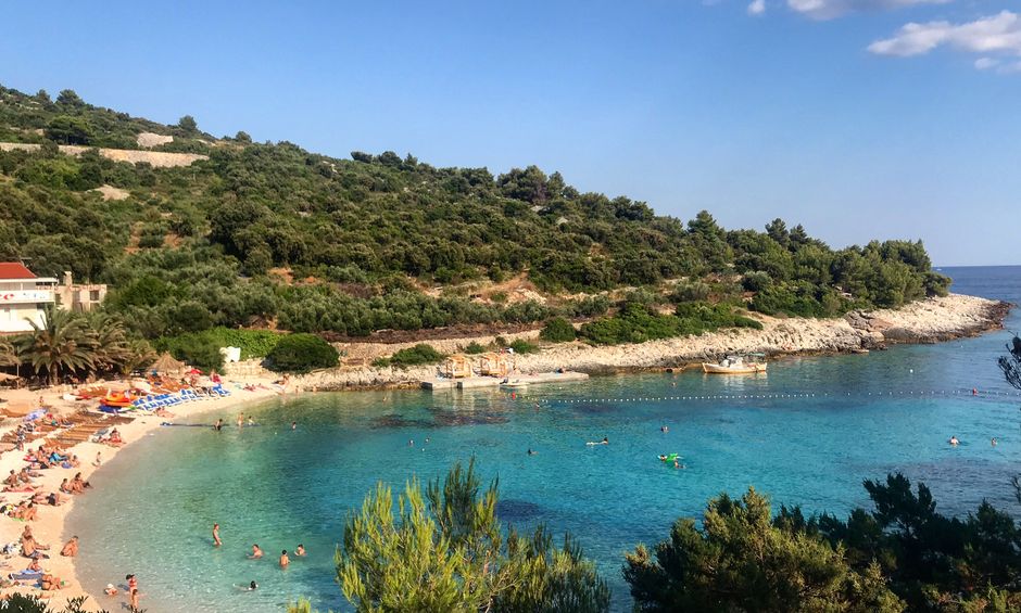 Scenic beach cove with clear turquoise waters at Vis Island, Croatia, perfect for a summer getaway. – Croatia's Best Nude Beaches at a Glance