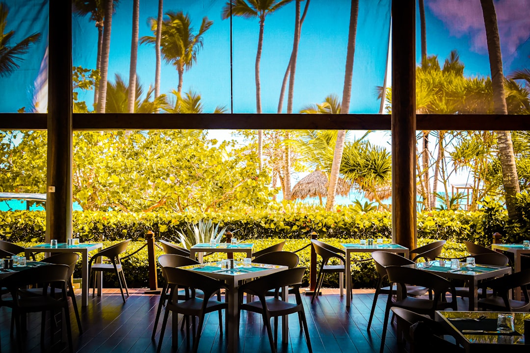Restaurant dining room with a beautiful outdoor view. – 4. Secrets Cap Cana Resort & Spa — Best for Foodies