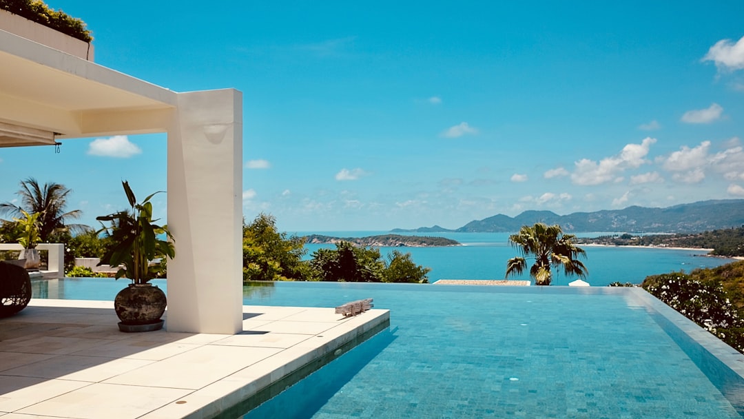 green leafed plant near white concrete post – 1. Cape Fahn Hotel — Best Overall Luxury