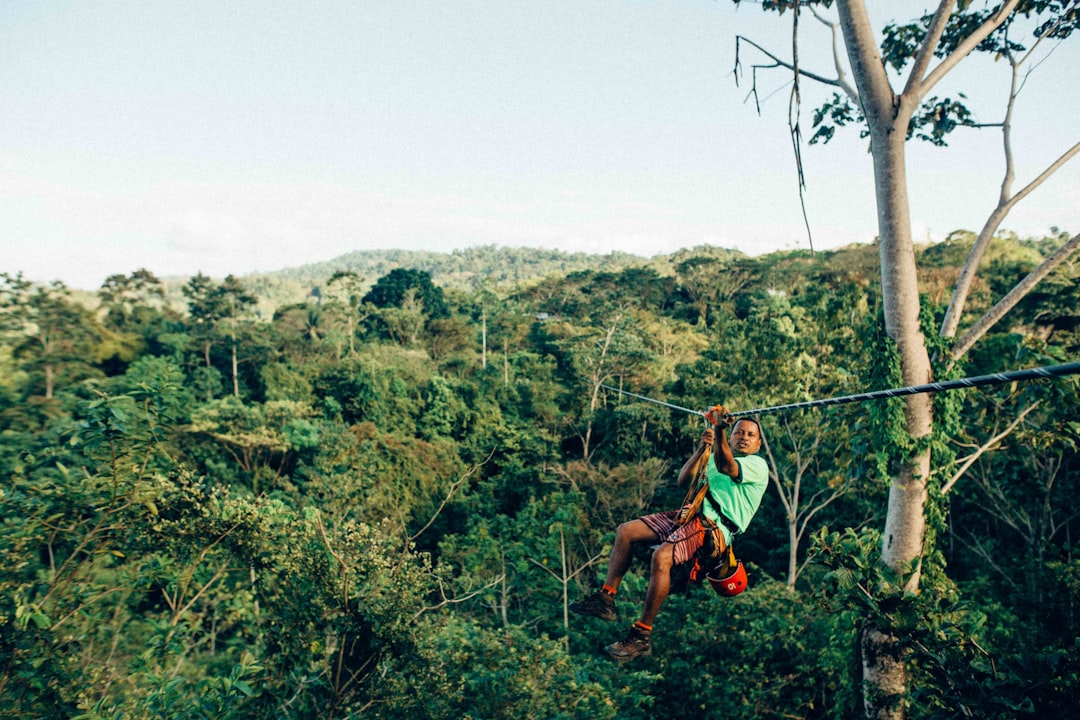 person sliding on zip line – Monteverde Cloud Forest Zipline: What Makes It Different
