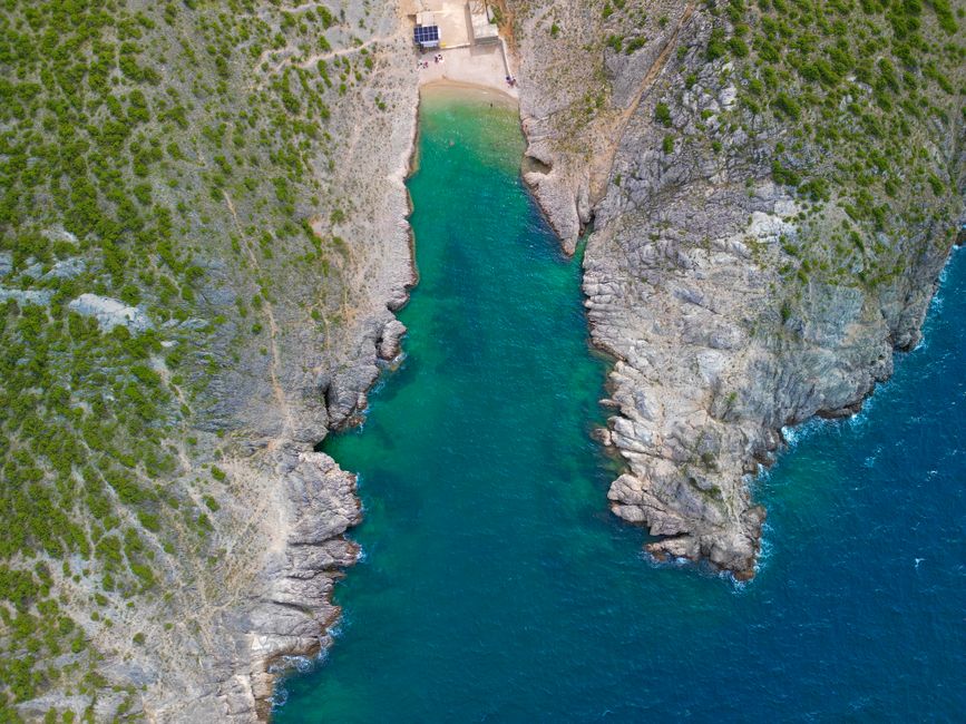 Stunning aerial view of rocky coastline and clear blue waters in Vrsi, Croatia. – Croatia's Best Nude Beaches at a Glance