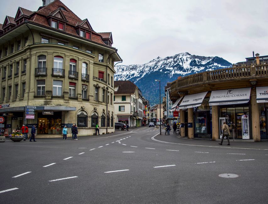 Exterior of aged historical buildings located on street in alpine town near snowy mountain on cloudy day in Interlaken – Pricing Breakdown 2026