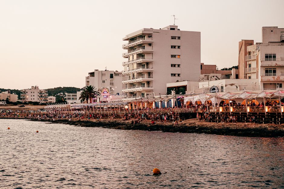 Lively Ibiza waterfront scene showcasing vibrant coastal nightlife at sunset. – When Ibiza Comes Alive: 2026 Season Dates