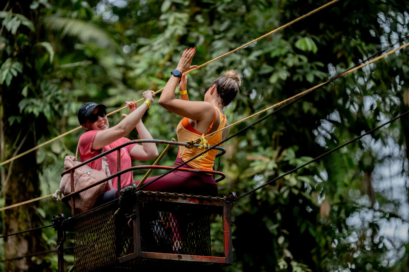 Two people enjoy an exhilarating ziplining experience in the lush jungles of Bajos del Toro, Costa Rica. – How Much Do Costa Rica Zipline Tours Cost in 2026?