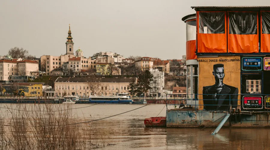Floating splav nightclub with a painted mural on the Sava – splav New Year's party ticket prices in Belgrade