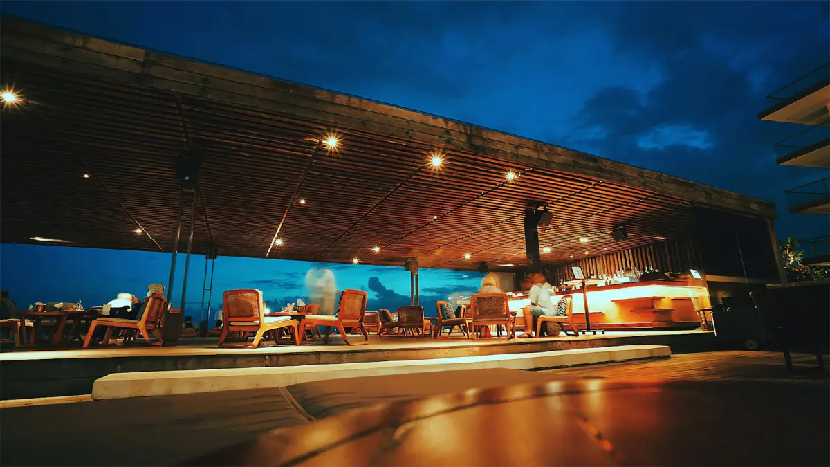 Resort terrace lounge lit at dusk – dress codes and evening venues, Riviera Maya