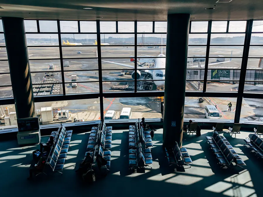 Near-empty gate lounge with aircraft parked outside the windows – judging how much layover time is enough, Tokyo Haneda