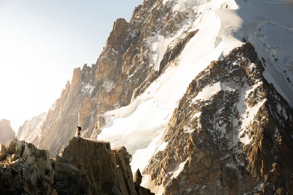 Mountaineer climbing a rocky alpine ridge in Chamonix – the extreme sports hidden in the policy small print