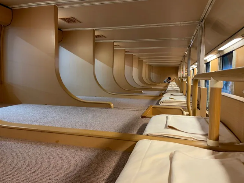 Experience the unique capsule beds on a Japanese sleeper train. – Seat, Couchette, or Sleeper — Which Class Should You Book?