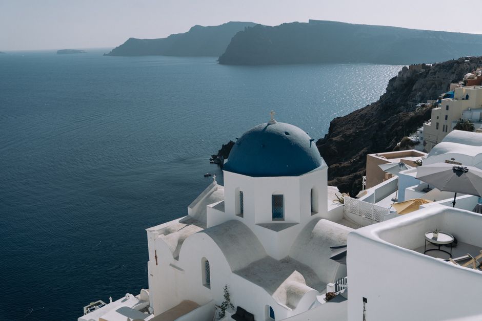 Explore the stunning blue-domed architecture of Santorini overlooking the Aegean Sea. – 7. Adriatic & Aegean Group Sailing — Croatia & Greece