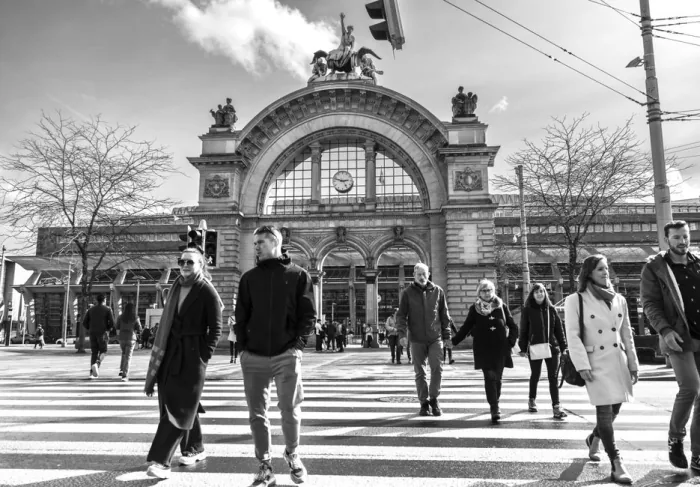 A bustling street scene in front of Lucerne train station, Switzerland. – 5 Tips to Make Your Pass Actually Worth It